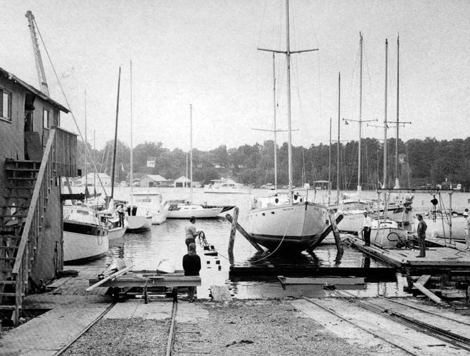 Charlevoix Courier photo, July 19, 1972, of Hamilton Boat Yard at north end of Alice Street, future site of LeHavre condominium.