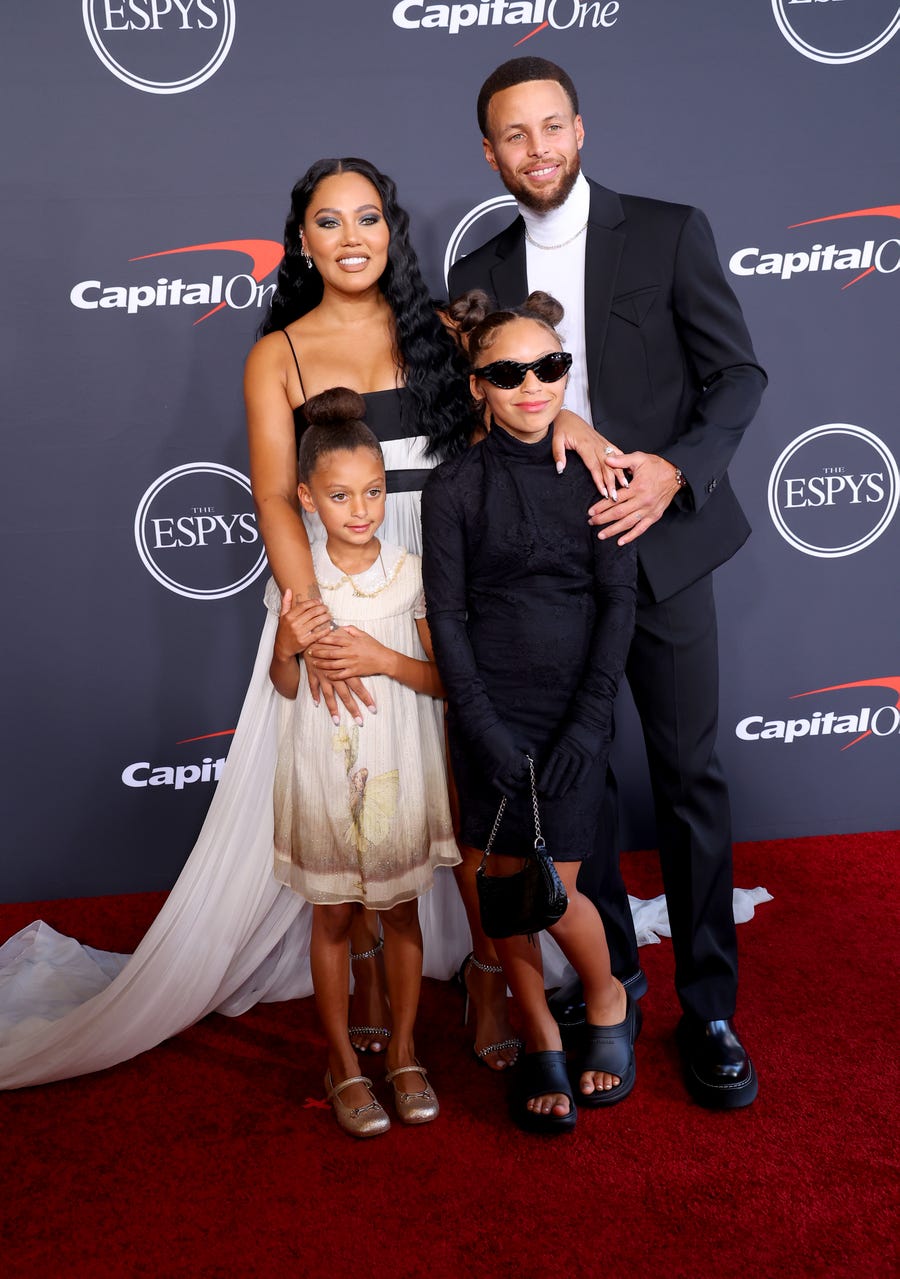 The most prominent athletes are trading in their uniforms for glitz and glam on the 2022 ESPY Awards red carpet in Los Angeles. Check out photos of all the stars, including the Curry family. From left to right, Ryan Carson Curry, Ayesha Curry, Riley Elizabeth Curry, and Stephen Curry, the host of this year's show.