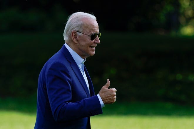 President Joe Biden walks on the South Lawn of the White House after stepping off Marine One, on Wednesday, July 20, 2022, in Washington. Biden was returning to Washington after traveling to Massachusetts to announce new actions on climate change. The next day, he tested positive for COVID.
