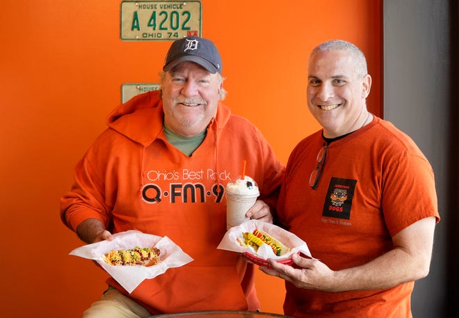 Columbus radio host Jerry Elliot, left, of QFM 96, has joined Ed Bisconti, right, of the local Borgata Pizza Cafes, in opening Junkyard Dogs, a new restaurant venture in Linworth.