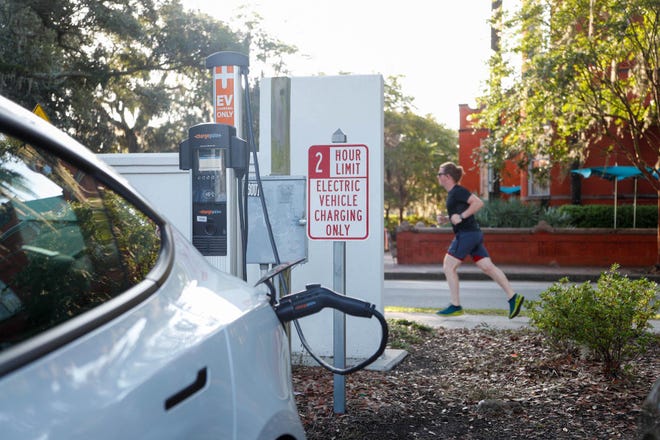 FILE — An electric vehicle charging station. Kitsap County is working on amending its code to require new construction and redevelopment to be equipped with electric vehicle charging stations.