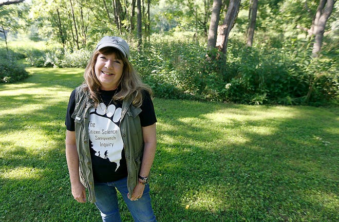 Suzanne Ferencak stands on her property near the Mohican River in Holmes County where she has reported Bigfoot activity.