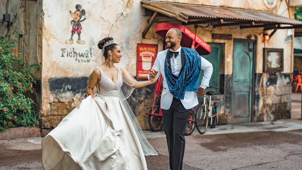 Bridal portrait sessions inside Disney theme parks must be booked through Disney's Fairy Tale Weddings & Honeymoons.