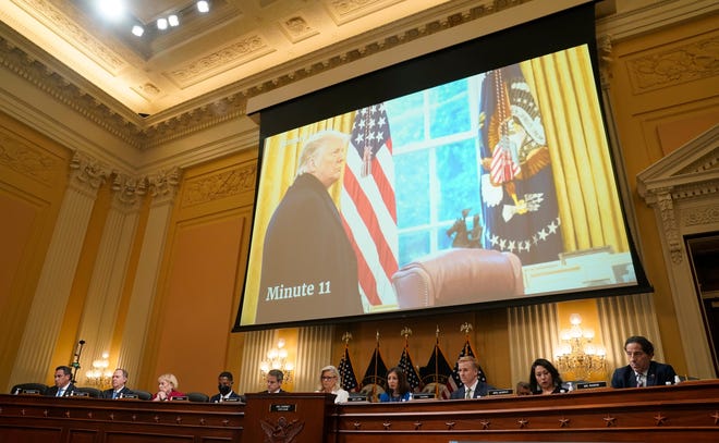 A photograph of former President Donald Turmp is projected during a public hearing before the House select committee to investigate the January 6 attack on the United States Capitol held on July 21, 2022.