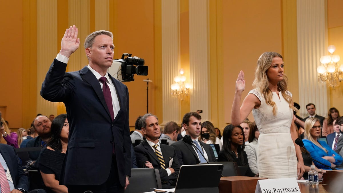 Jul 21, 2022; Washington DC, United States;  Matthew Pottinger (left) and Sarah Matthews are sworn in before testifying at public hearing before the House select committee to investigate the January 6 attack on the United States Capitol held on July 21, 2022. Matthews is a former deputy press secretary and Pottinger is a former  deputy national security adviser in the Trump administration. Mandatory Credit: Jack Gruber-USA TODAY ORG XMIT: USAT-495550   (Via OlyDrop)