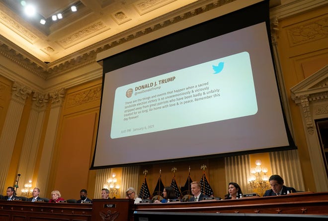 A Tweet from former President Donald Trump is shown during a public hearing before the House select committee to investigate the January 6 attack on the United States Capitol held on July 21, 2022.