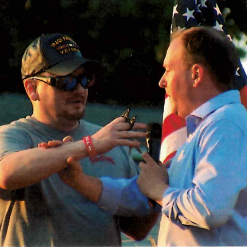 Photo showing David Jakubonis threatening Congress