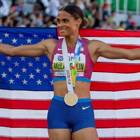 Sydney McLaughlin celebrates after setting the wor