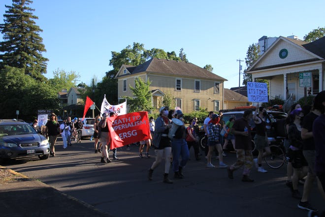 A group of about 50 on Saturday briefly marched through streets in Eugene to show not all residents are excited the city is hosting the World Athletics Championships Oregon22. Some activists claim the city prioritized beautifying the city for the event's thousands of guests over addressing existing issues like homelessness.