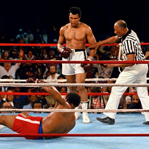 Muhammad Ali knocked down defending heavyweight ch