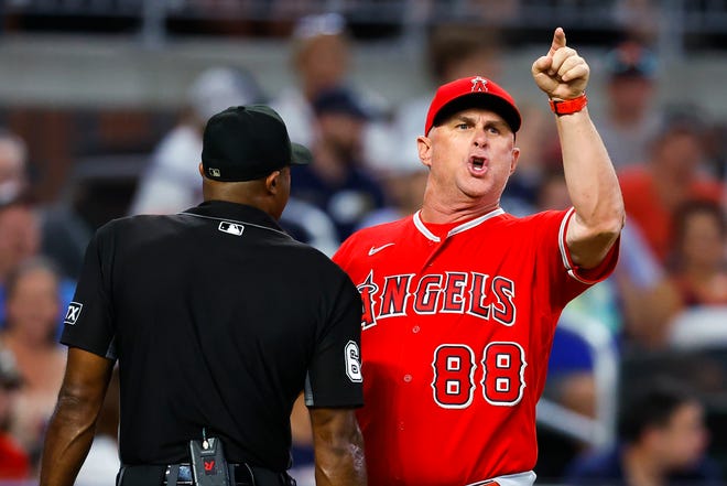 Angels interim manager Phil Nevin was ejected in the fifth inning vs. the Atlanta Braves.