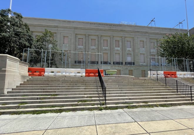 The front steps of the Alton Lennon Federal Building and U.S. Courthouse as seen on July 25, 2022. The building has been closed for repairs since Hurricane Florence in 2018.