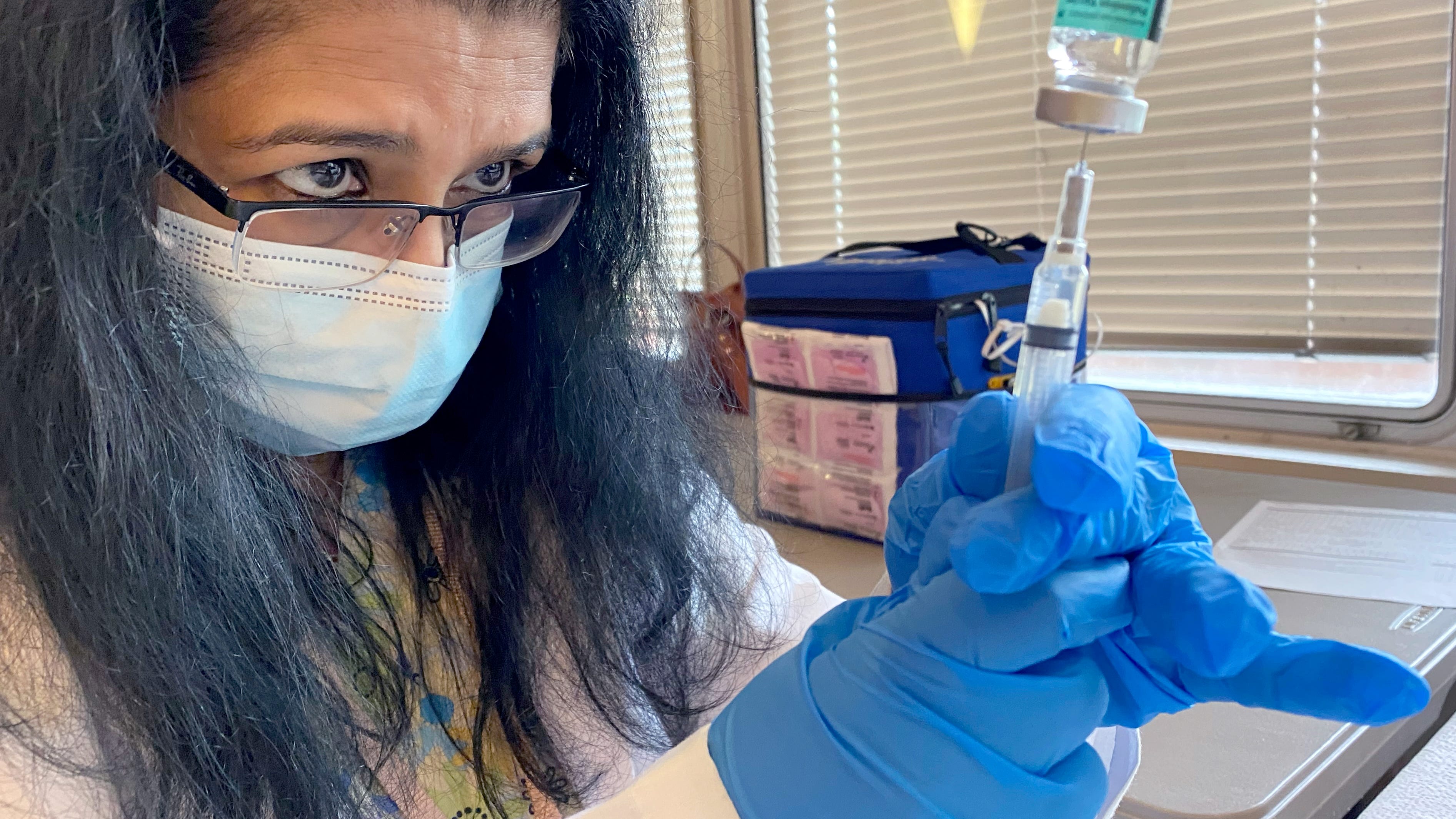 Supervising Public Health Nurse Beena John administers a shot with the polio vaccine at Rockland County's Yeager Health Center in Pomona July 25, 2022. 