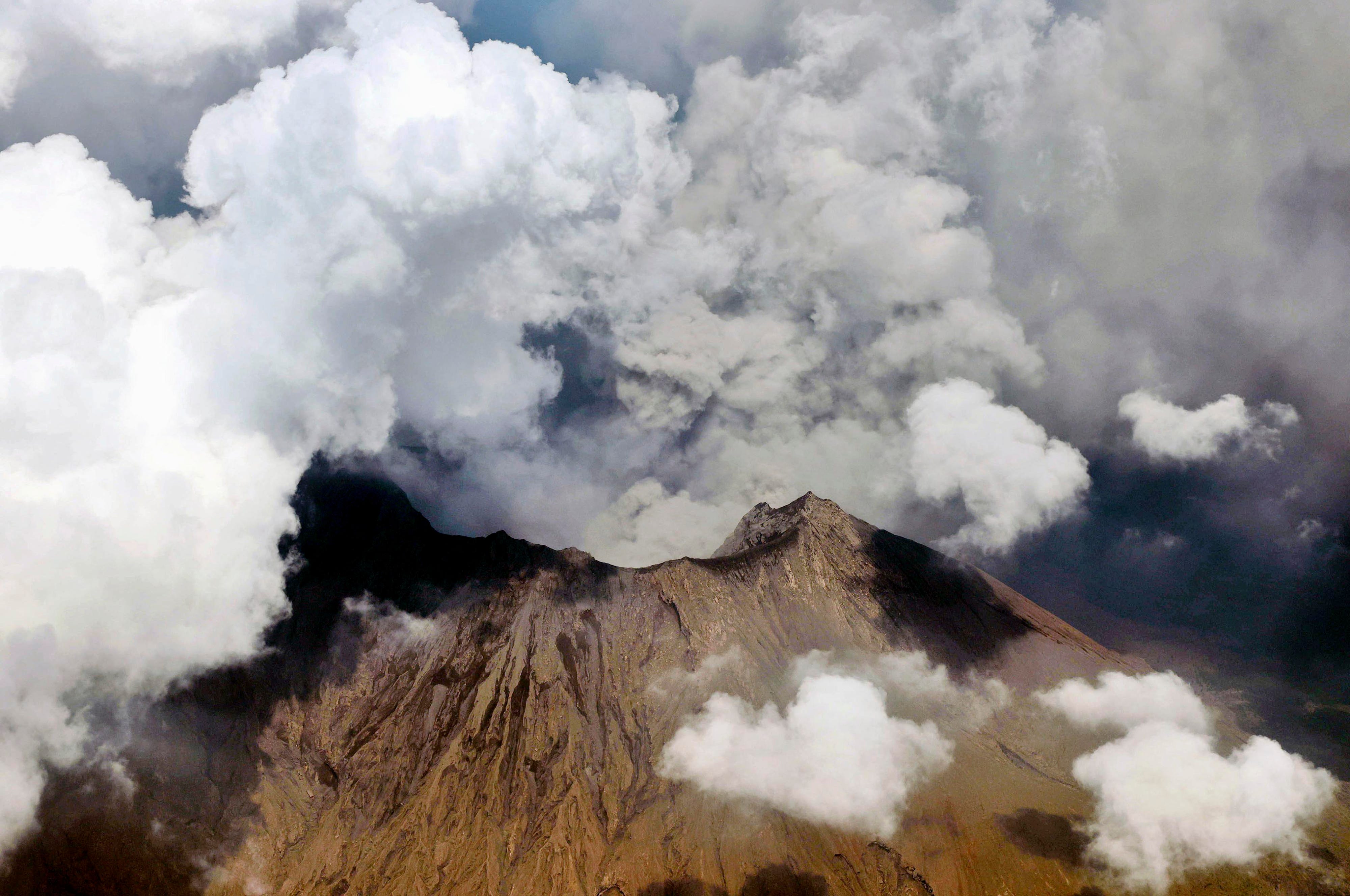 Falling ash, searing gas: Photos show eruption of Sakurajima volcano in Japan thumbnail