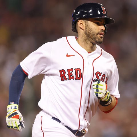 Red Sox designated hitter JD Martinez rounds the b