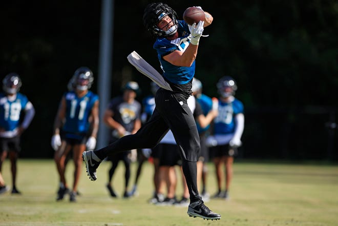 Jaguars tight end Dan Arnold pulls in a pass during a training camp practice on July 26 at the Episcopal School's Knight Campus. The receivers and secondary can start mixing it up a little bit more on Sunday when the team goes into full pads.