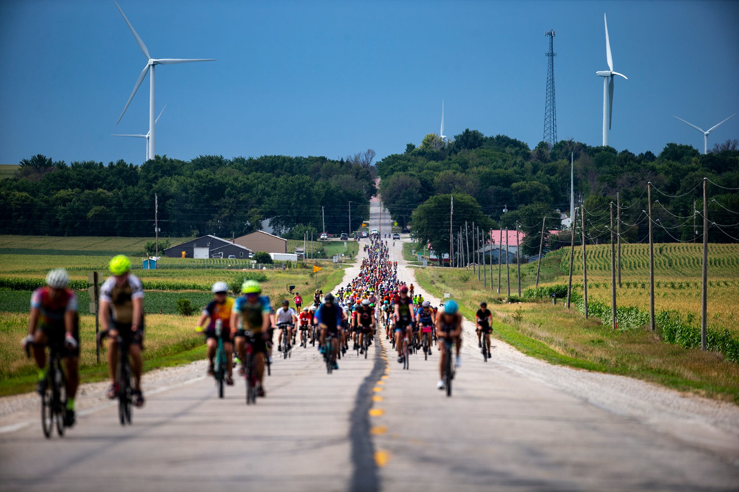 Cyclists make their way to Pocahontas from Schaller during the second day of RAGBRAI Monday, July 25, 2022.