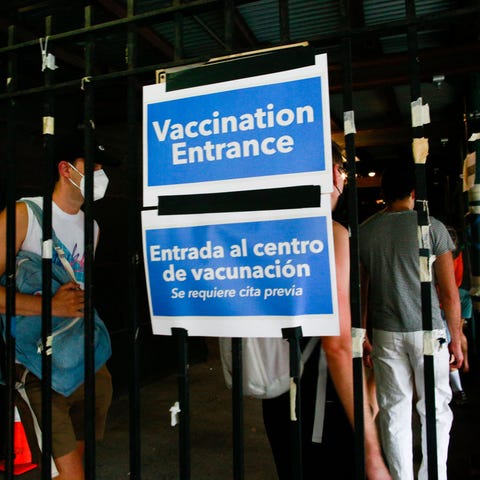 People wait in line to recieve the Monkeypox vacci