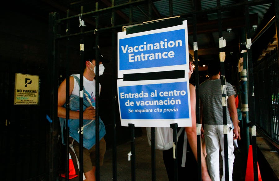 People wait in line to recieve the Monkeypox vaccine before the opening of a new mass vaccination site at the Bushwick Education Campus in Brooklyn on July 17, 2022, in New York City. (Photo by Kena Betancur / AFP) (Photo by KENA BETANCUR/AFP via Getty Images) ORIG FILE ID: AFP_32EP3M3.jpg