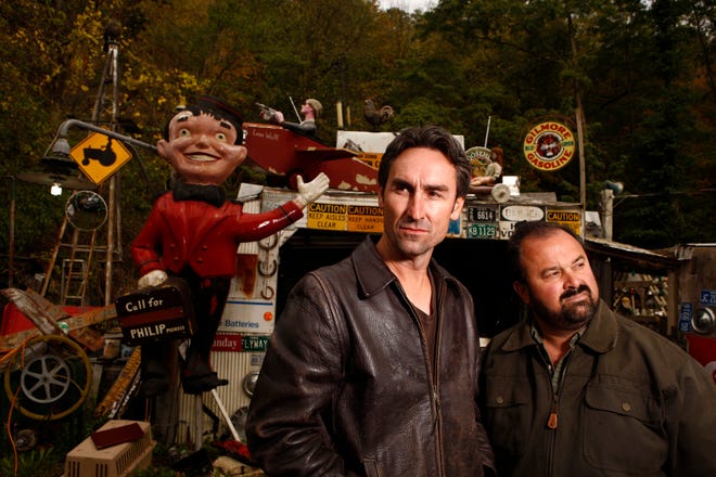 Mike Wolfe, left, and Frank Fritz co-hosted the TV show "American Pickers." Fritz was hospitalized after suffering a stroke, Wolfe shared on Instagram July 21, 2022.