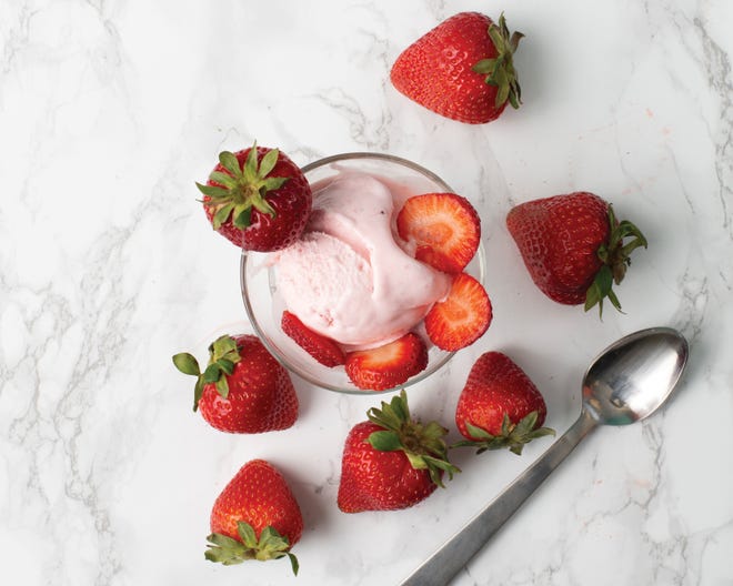 A scoop of Velvet Ice Cream's strawberry flavor