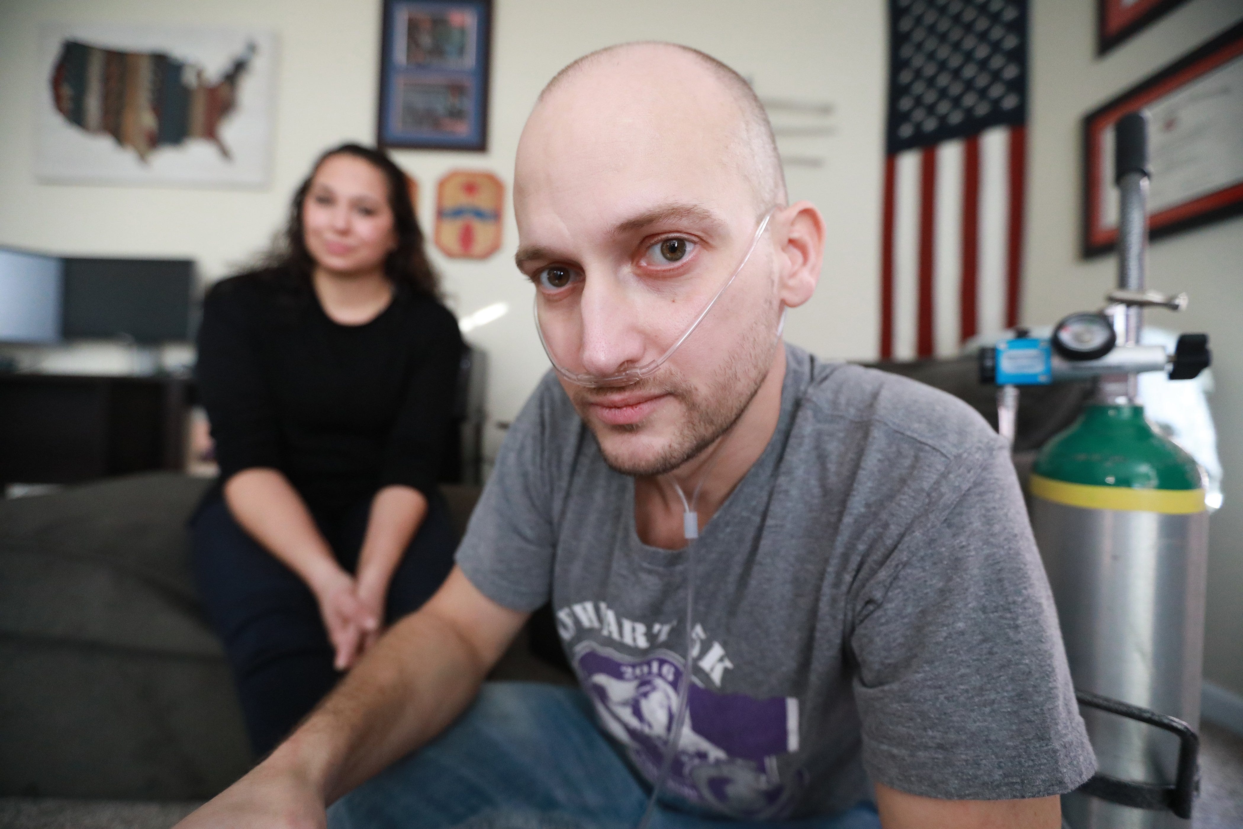 Biden signs burn pit law named for Ohio veteran Heath Robinson