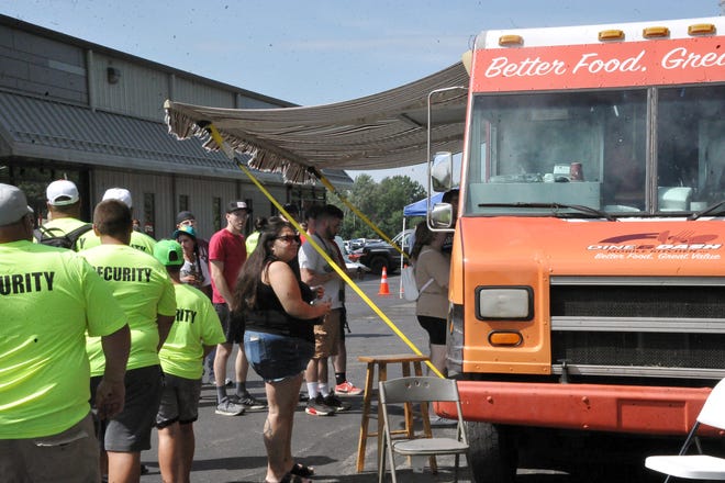 Food trucks and tents were a big draw at the NASCAR event at Jarrett Logistics.