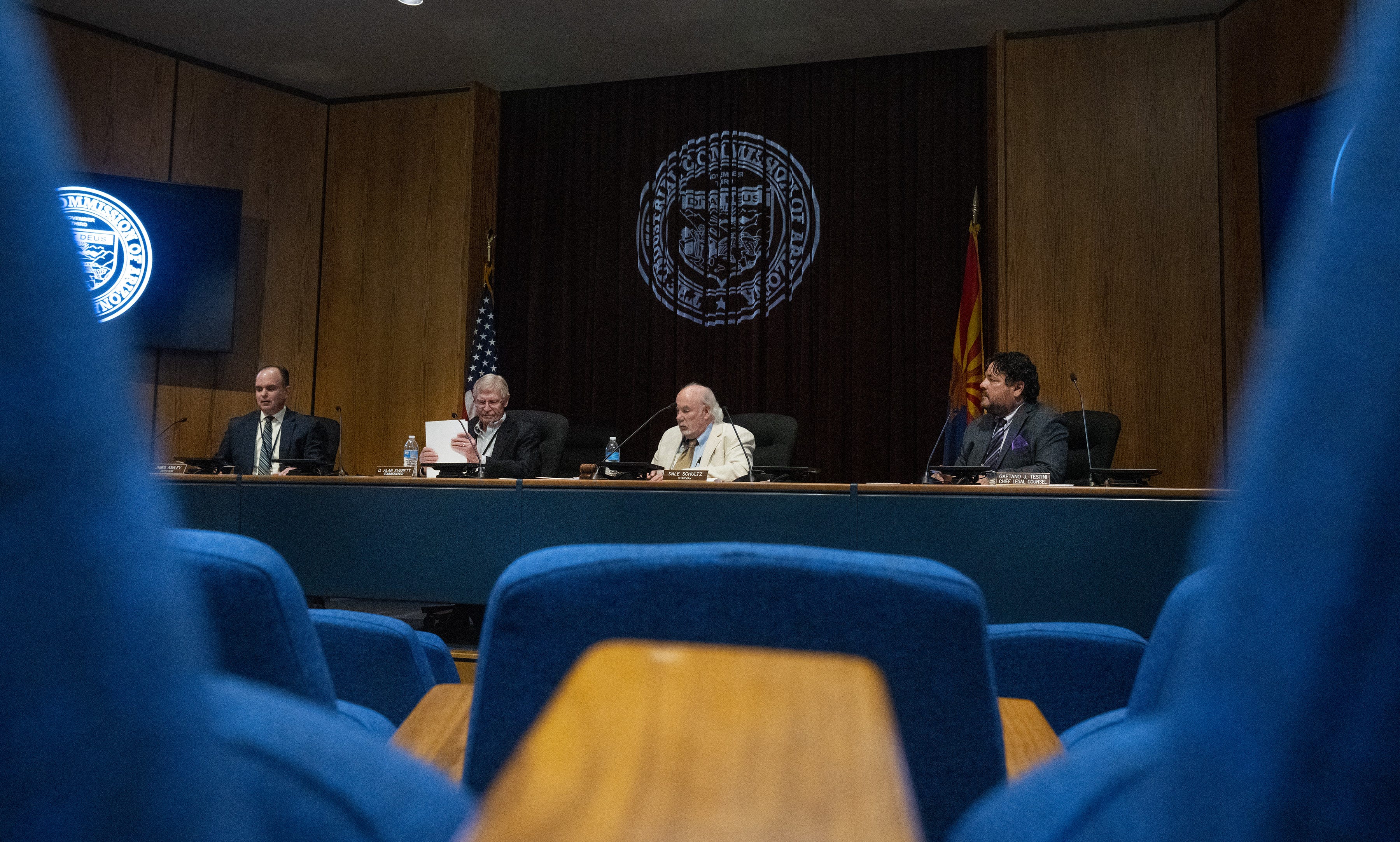 Industrial Commission of Arizona Director James Ashley (from left), Commissioner D. Alan Everett, Chairman Dale Schultz, and Gaetano Testini, chief legal counsel, attend a meeting in Phoenix on July 14, 2022.