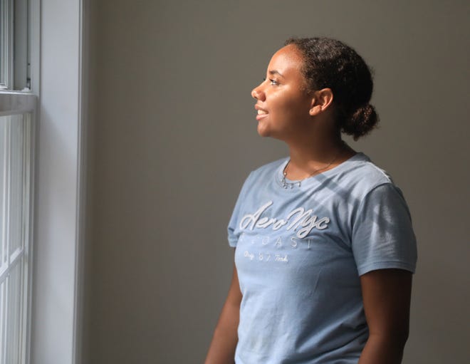 Aaliyah Victor admires the view out of a window at her home in Wappingers Falls on July 28, 2022. Victor's family is a recipient of a Habitat for Humanity home and will be moving in to the house in early August.