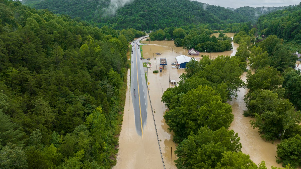 Buildings and roads are flooded near Lost Creek, Ky., Thursday, July 28, 2022. Heavy rains have caused flash flooding and mudslides as storms pound parts of central Appalachia. Kentucky Gov. Andy Beshear says it's some of the worst flooding in state history.