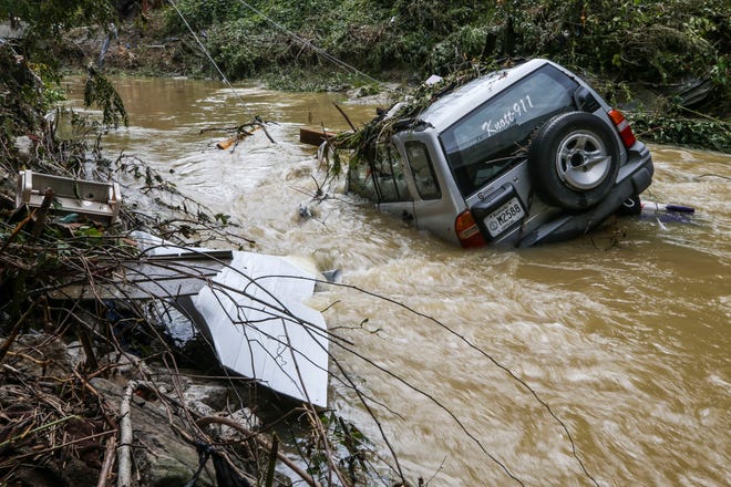 A Knott County 911 emergency vehicle was washed into the Right Fork Troublesome Creek in Hindman. July 29, 2022