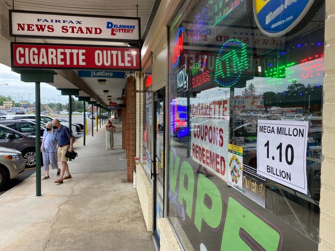 Fairfax Newsstand off Route 202 displays a recently printed-out sign advertising the $1.1 billion Mega Millions jackpot in July 2022.
