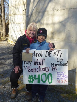 Tao Le Marchand (Ty) at the Pennsylvania Wolf Sanctuary delivering his donation