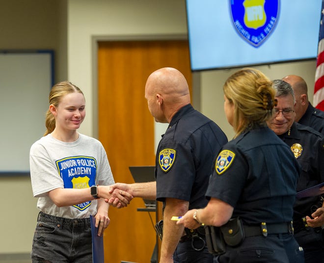 Newly graduated junior police academy alum Gabrielle Hegglund received her certificate Friday during a ceremony held at the Wichita Falls Training Center.
