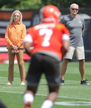 Cleveland Browns owners Dee and Jimmy Haslam keep an eye on bacjup quarterback Jacoby Brissett as they take in training camp workouts on Thursday, July 28, 2022 in Berea.
