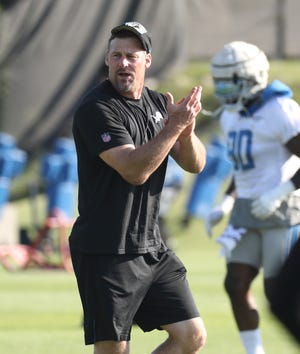 Detroit Lions head coach Dan Campbell on the field during drills Saturday, July 30, 2022 at the Allen Park practice facility.