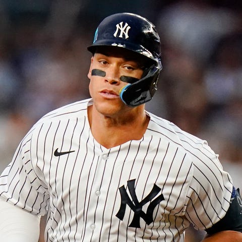 New York Yankees' Aaron Judge runs the bases after