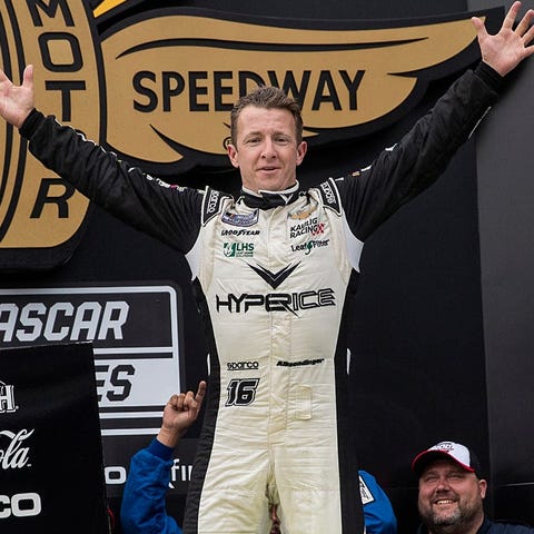 AJ Allmendinger (16) celebrates after winning the 