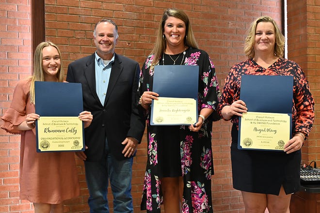 Southwestern Oklahoma State University (SWOSU) students (left) Rhiannon Calfy of Temple, (third from left) Jennifer Nightengale of Foss and Abigail Ulery of Yukon were recently honored with Reach Higher awards at the Everett Dobson School of Business and Technology spring awards ceremony on the Weatherford campus. With them is Dr. Todd Wiggen, coordinator of SWOSU’s organizational leadership program—Reach Higher Flex Finish.