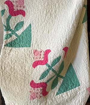 This tulip quilt was lovingly created by Dawn Taylor's grandmother, Frances Taylor. The photo was posted to Facebook after the quilt was accidentally dropped off with donated items to Ames' Rummage RAMPage and sold on Saturday. It was returned by the buyer on Sunday after the Facebook post was shared by more than 700 people.