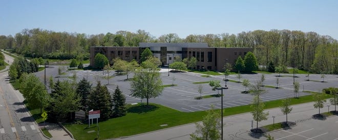 Gahanna officials are considering 825 Tech Center Drive as a new home for City Hall, the police division and a senior center.