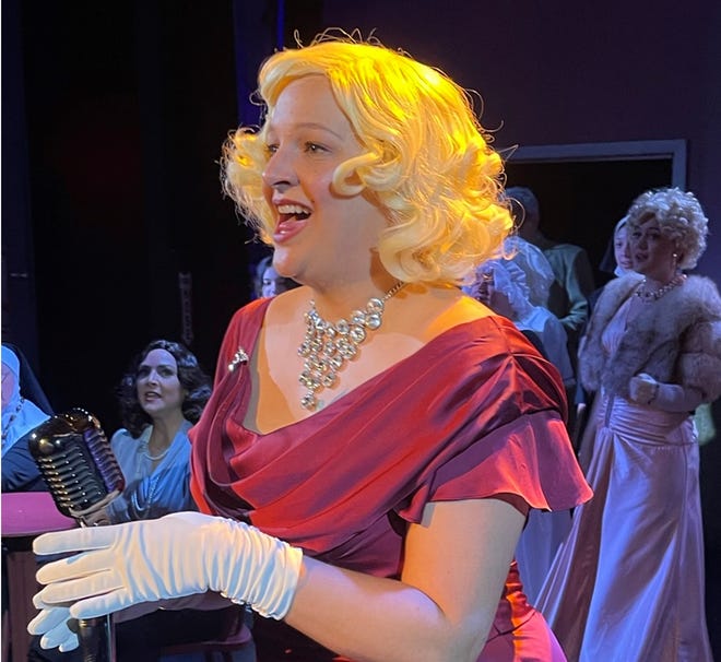 "gretta of flame," played by Jennifer Jesseman, appears in the Speak-Easy in the audience participation mystery comedy, "The fall of the golden goose" on stage at the Surfside Playhouse in Cocoa Beach through August 14, 2022. Visit surfsideplayers.com.