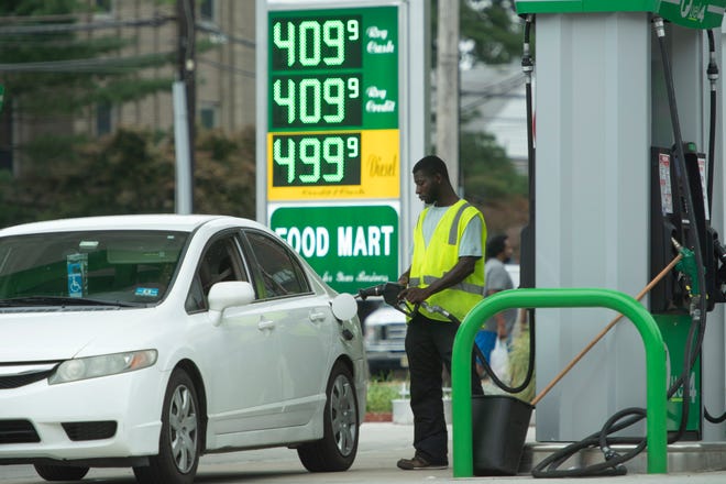 A car fills up with gas at a gas station on Teaneck Rd in Teaneck, New Jersey, on Monday, August 1, 2022. 