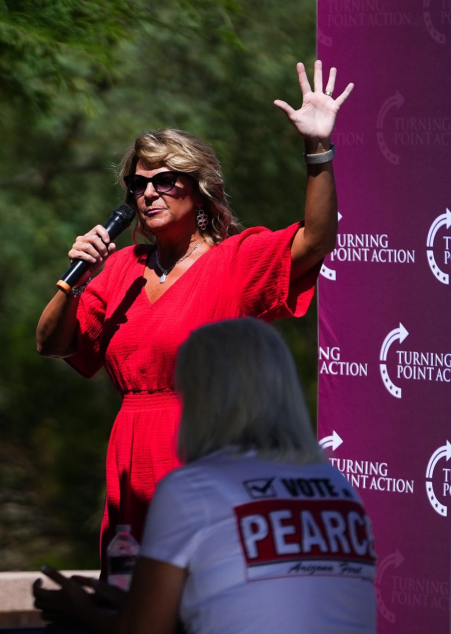 Kelli Ward, head of the Arizona Republican Party, speaks to attendees during a get out the vote rally event put on my Turning Point Action on Saturday, July 30, 2022, in Mesa.