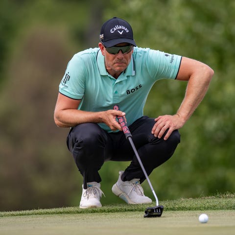 Henrik Stenson lines up a putt during the final ro
