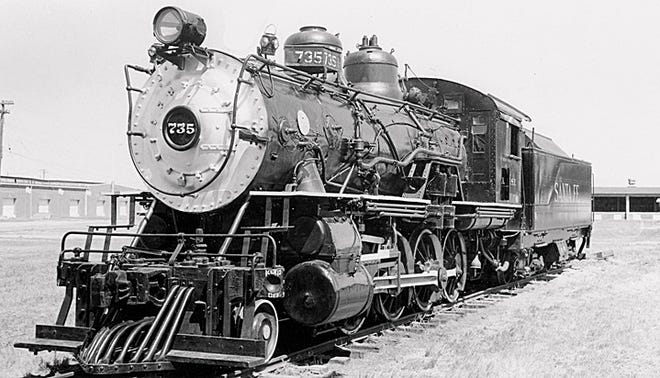 The Santa Fe #735 steam locomotive used to be on display on the old spur tracks at the Kansas State Fair. 