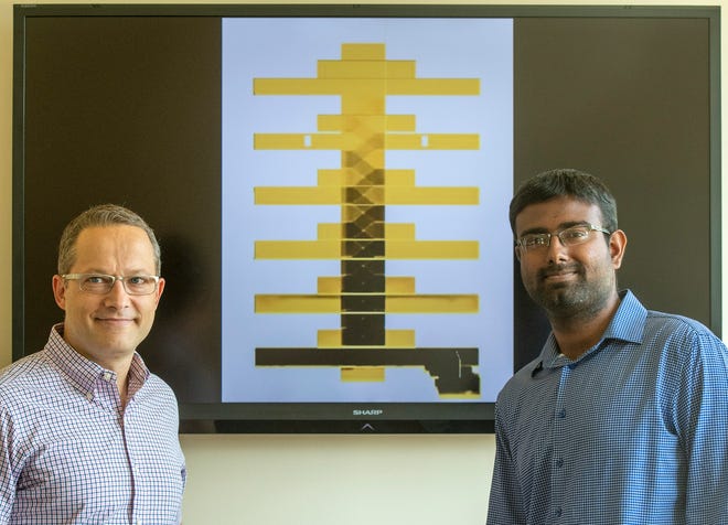 Albert Simeoni, left, and Muthu Kumaran Selvaraj created a simulation of smoke spreading through a 19-story apartment building.
