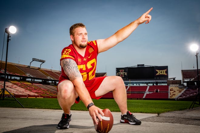 Trevor Downing poses for a photo Tuesday during Iowa State Football Media Day at Jack Trice Stadium in Ames.