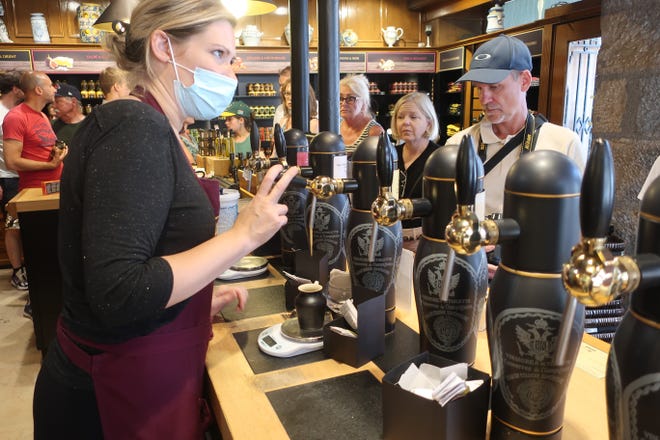 Dijon mustard, infused with white wine, is dispensed by tap at the popular Moutarde Maille shop in Dijon, France.