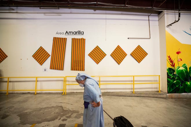 A Catholic nun arrives at the Casa del Refugiado of the House of the Annunciation on August 1, 2022. The refuge was preparing to close its doors in early August 2022.